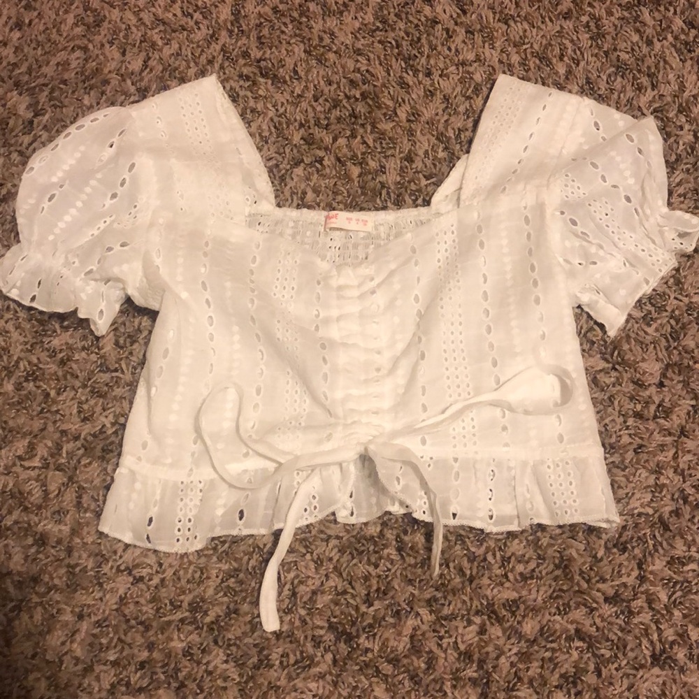 White puff-sleeve ruched front top